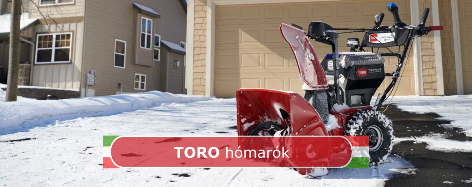 piros toro hómaró hóval és házzal a háttérben